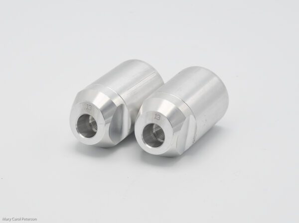 A pair of H Camber axle insert kneelers on a white background.