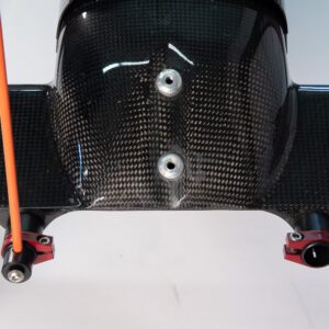 A close up of a carbon fiber bike frame.image