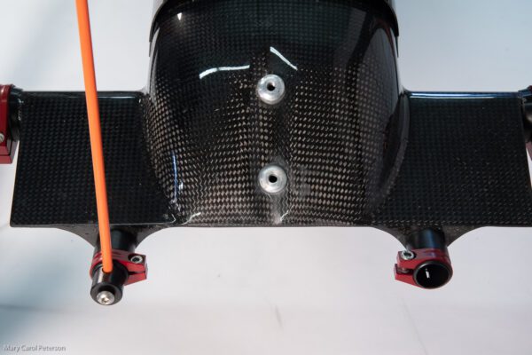 A close up of a carbon fiber bike frame.image