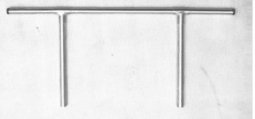 A black and white photo of two H Draft bumpers on a white surface.