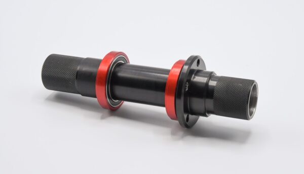 A black and H Bottom bracket spindle bicycle hub with a red rim.