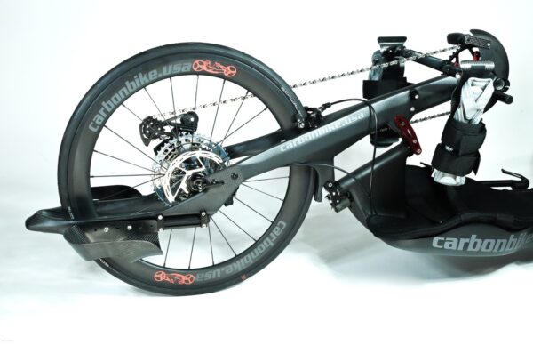 A bike with an H-Open Carbon Fiber Footrest attached to it.