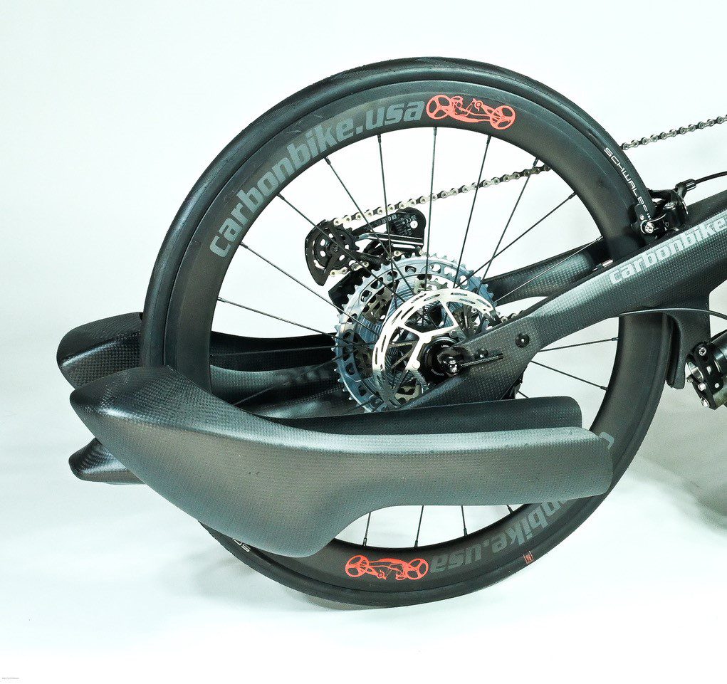 An image of a bicycle with H-Open Carbon Fiber Footrests on it.